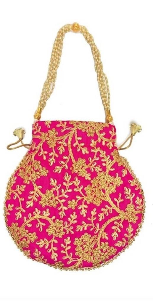 Gorgeous pink Rajasthani Style trendy Potli with heavy embroidery and vibrant colors 